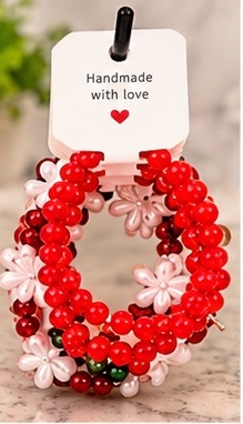 Bracelet 04 shown completely on its handmade display card