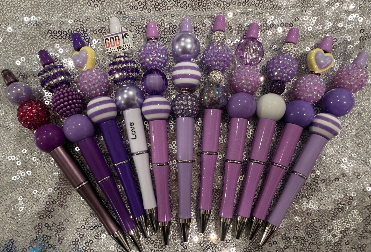 Complete collection of purple and lavender handmade beaded pens